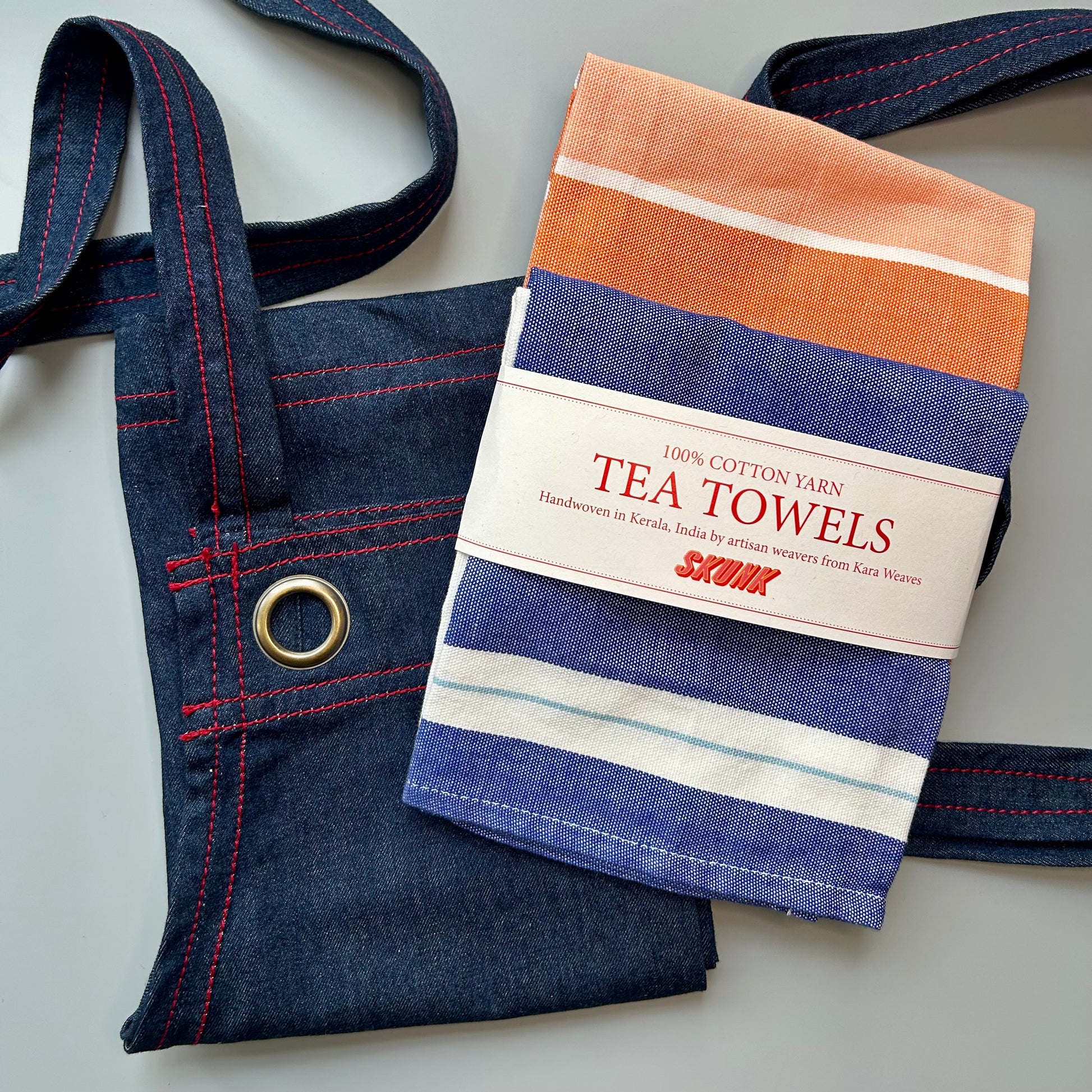 Denim apron + orange and blue tea towel set